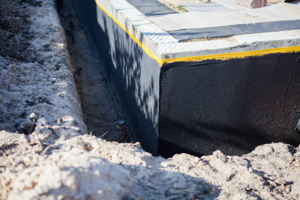 Professional Waterproofing technician working in Springwater, NY